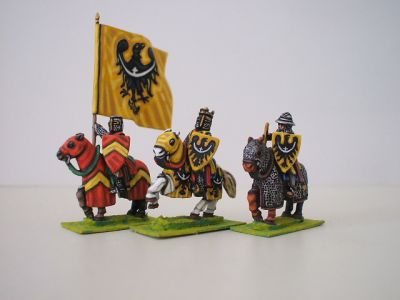 Feudal Mounted king with standard bearer and trumpeter 1230-1250 ca 
1195 to 1250 Feudal range from [url=http://www.legio-heroica.com/]Legio Heroica[/url]. Pictures provided by the manufacturer 
Keywords: efknights crusader latins emgerman