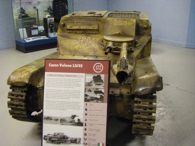 Italian L3 Lf flamethrower flame tank 
The "L3 Lf" flamethower (lancia fiamme) flame tank was another variant of the L3 tankette. Development began in 1935. The flamethrower nozzle replaced one of the machine guns, and the flame fuel was carried in an armored 500L (133 gallons) fuel trailer towed by the vehicle. Later versions had the fuel carried in a box-shaped tank mounted above the L3's engine compartment. The vehicle weighed 5 tonnes. The L3 Lf saw action in Abyssinia, Spain, France, the Balkans, North Africa, and Italian East Africa. From 1936 each CV/L3 company had a single L3 Lf platoon.
