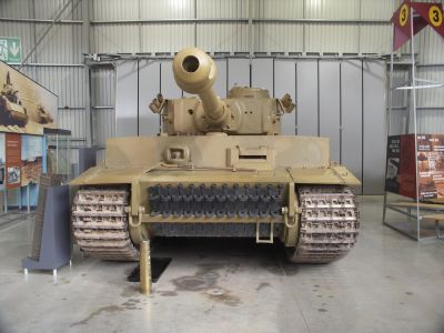 The Tiger I
The Tiger tank was too heavy for small bridges, so it was designed to ford four-metre deep water. This required unusual mechanisms for ventilation and cooling when underwater. At least 30 minutes of set-up time was required, with the turret and gun being locked in the forward position, and a large snorkel tube raised at the rear. The two rear compartments (each containing a fuel tank, radiator and fans) were floodable. Only the first 495 units were fitted with this deep fording system; all later models were
