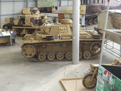 Pz III
Panzer III was the common name of a medium tank that was developed in the 1930s by Germany and was used extensively in World War II. The official German designation was Panzerkampfwagen III Sd Kfz. 141 (abbreviated PzKpfw III) translating as "armoured fighting vehicle". It was intended to fight other armoured fighting vehicles and serve alongside the infantry-supporting Panzer IV. However, as the Germans faced the formidable T-34, stronger anti-tank guns were needed. Since the Panzer IV had a bigger turret 
