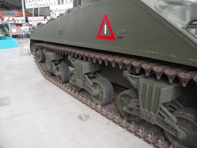 Sherman 
The gun on the original M4 was the short-barreled medium-velocity 75 mm M3 gun. When it first saw combat in North Africa in late 1942 against the Panzer III and Panzer IV, the Sherman's gun could penetrate the armor of these tanks within 1,000 yd (910 m). U.S. Army Intelligence discounted the arrival of the Tiger I in late 1942 and the Panther tank in 1943, predicting the Panther to be a heavy tank like the Tiger, and doubted they would produce many
