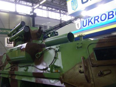 BTR-4
New Ukranian upgrade/variant of the "classic" BTR see [url=http://en.wikipedia.org/wiki/BTR-4]wikipedia[/url] for details. This prototype is armed with the locally designed New Armament Module which is armed with one 30mm automatic cannon, 7.62mm coaxial machine-gun, up to four 9P135M Konkurs or Baryer Anti-tank missiles (two on each side of the turret), and one 30mm automatic grenade launcher (fitted in place of the AT missiles on one left-hand side of the turret).
