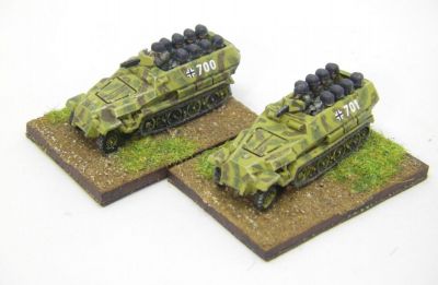 Red 3 Sdkfz Hanomags with crew
Thew crew come as 2 strips of seated men and a separate gunner with gun and mantlet cast as a single piece 
