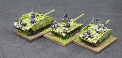 Stugs
The larger one is the new multi-part Arrowhead kit. The smaller one is an older, single piece but now discontinued version. The one without schurzen is from Pendraken.  Tank riders are Arrowhead
Keywords: Compare