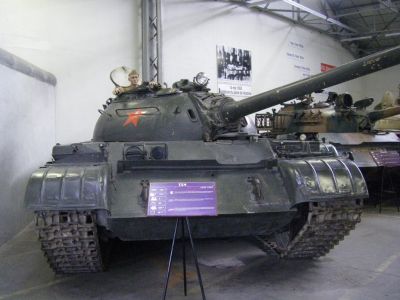 T54
The T-54 and T-55 tanks are a series of Soviet main battle tanks introduced just as the Second World War ended. The first T-54 prototype appeared in March 1945 and entered full production in 1947. It became the main tank for armoured units of the Soviet Army, armies of the Warsaw Pact countries, and many others. T-54s and T-55s were involved in many of the world's armed conflicts during the late 20th century.

The T-54/55 series eventually became one of the most-produced tank in military history. Estimated production numbers for the series range from 86,000 to 100,000. They were replaced by the T-62, T-64, T-72, T-80, and T-90 in the Soviet and Russian armies, but remain in use by up to 50 other armies worldwide, some having received sophisticated retrofitting.
