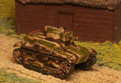 Polish 7TP-B 6 ton tank 
From [url=http://www.pithead-miniatures.tk/] Pithead Miniatures[/url], This single turreted tank was armed with a 37mm Swedish Bofors anti-tank gun and one 7.92mm Browning machine gun. Produced from late 1938, they were fitted with radio equipment mounted a rear turret storage bin. Designated the 7TPjw, a total of 97 were produced. These tanks were known to have been used by the second company of the second tank battalion in September 1939. 
Keywords:  Polish