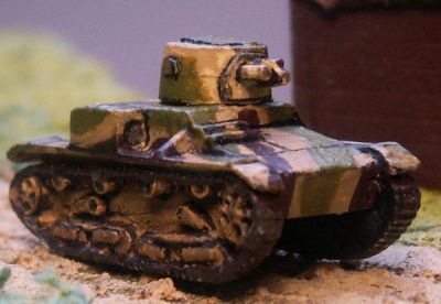 Polish Vickers/ Ursus VAU 33 6 ton tank 
From [url=http://www.pithead-miniatures.tk/] Pithead Miniatures[/url], This was the Polish version of the Vickers 6 ton tank produced at the Ursus plant under licence. Armed with a short barrel 47mm cannon . 34 examples were used to equip two light tank companies including 121 company of the 10th mechanised "Black" brigade in September 1939. 
Keywords:  Polish