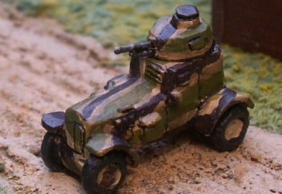 Polish Wz 34 armoured car 
From [url=http://www.pithead-miniatures.tk/] Pithead Miniatures[/url], This curious "Dalek" like armoured car was mainly armed with a single 7.92mm wz.25 machine gun though some versions mounted a 37mm SA-18 cannon. Thirteen Wz 34's were used to equip the scout car company attached to each Polish infantry division. 
Keywords:  Polish