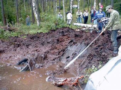 T34/76A recovered from an Estonian lake
T34/76A in German markings recovered (alledgedly in working order) from an Estonnian lake. Follow [url=http://www.englishrussia.com/?p=299]this link[/url] for the full story 
Keywords:  Russian German