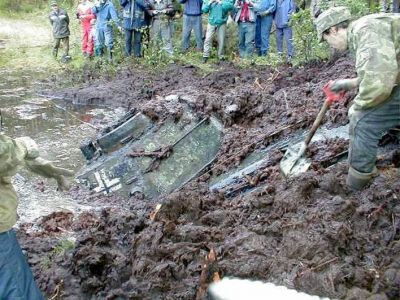 T34/76A recovered from an Estonian lake
T34/76A in German markings recovered (alledgedly in working order) from an Estonnian lake. Follow [url=http://www.englishrussia.com/?p=299]this link[/url] for the full story 
Keywords:  Russian German