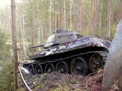 T34/76A recovered from an Estonian lake
T34/76A in German markings recovered (alledgedly in working order) from an Estonnian lake. Follow [url=http://www.englishrussia.com/?p=299]this link[/url] for the full story 
Keywords:  Russian German